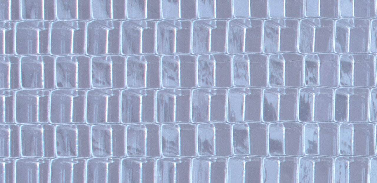 Nahaufnahme der transparenten Akustik-Trennwände mit Waben-Struktur